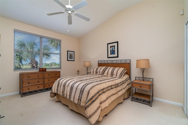 bedroom with light carpet, vaulted ceiling, and ceiling fan