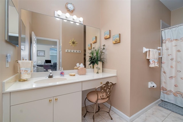 bathroom featuring vanity and curtained shower