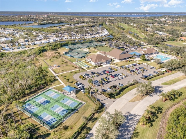 birds eye view of property with a water view