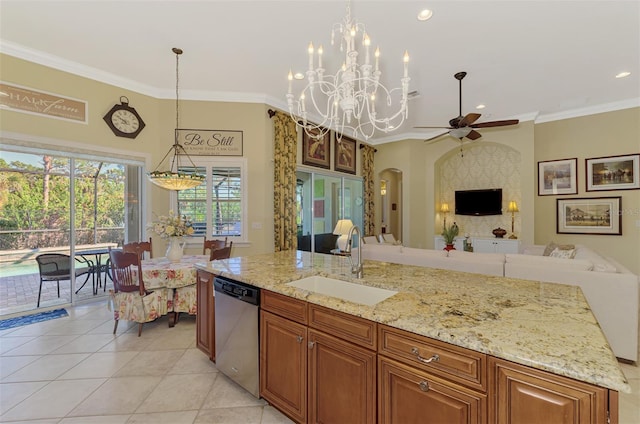 kitchen featuring dishwasher, an island with sink, sink, hanging light fixtures, and ornamental molding