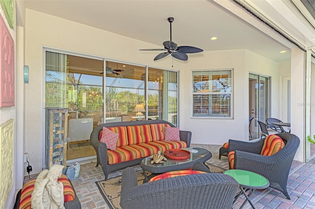 view of patio with ceiling fan and an outdoor hangout area