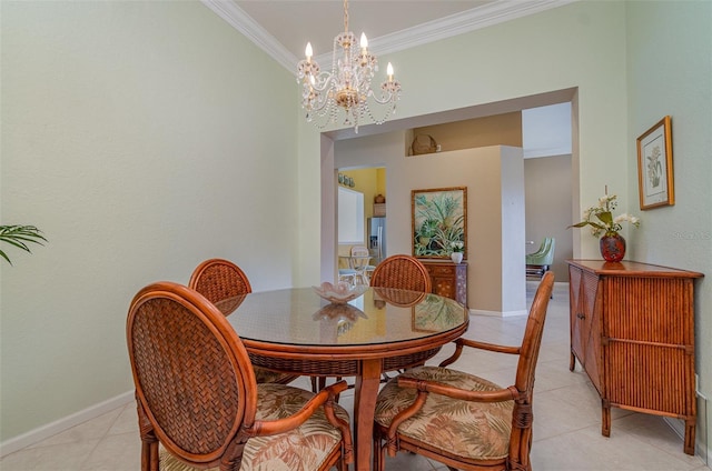 tiled dining room with ornamental molding and a chandelier