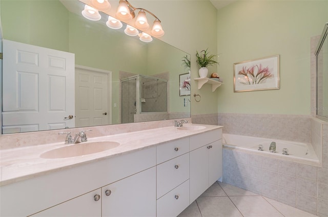 bathroom featuring tile patterned flooring, plus walk in shower, vanity, and an inviting chandelier