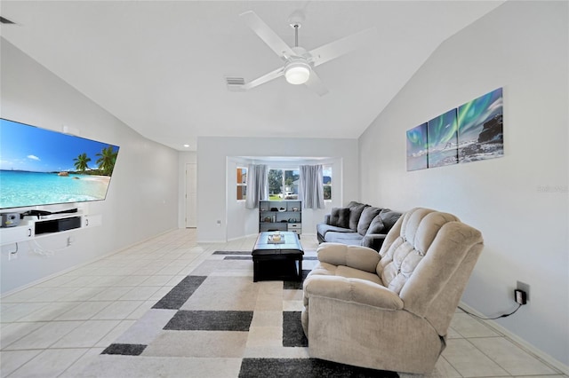 tiled living room with lofted ceiling and ceiling fan