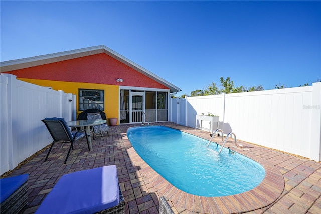 view of pool with a patio