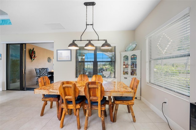 dining room featuring light tile patterned floors