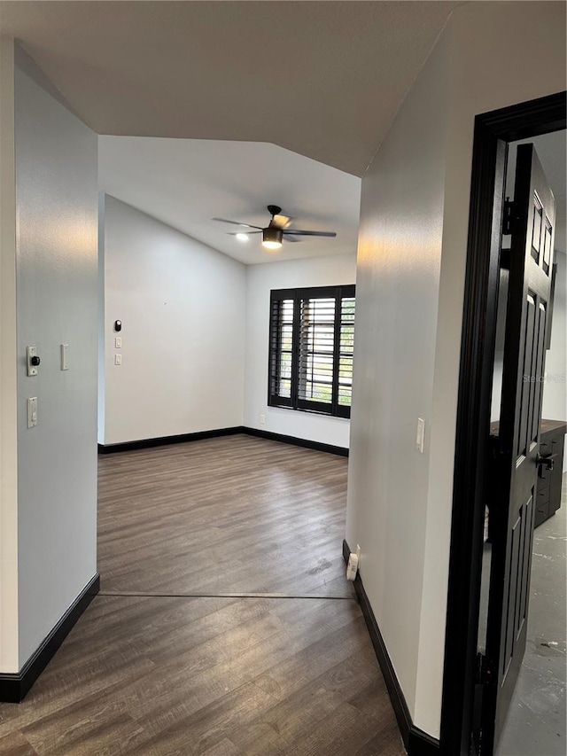 spare room with hardwood / wood-style flooring and ceiling fan