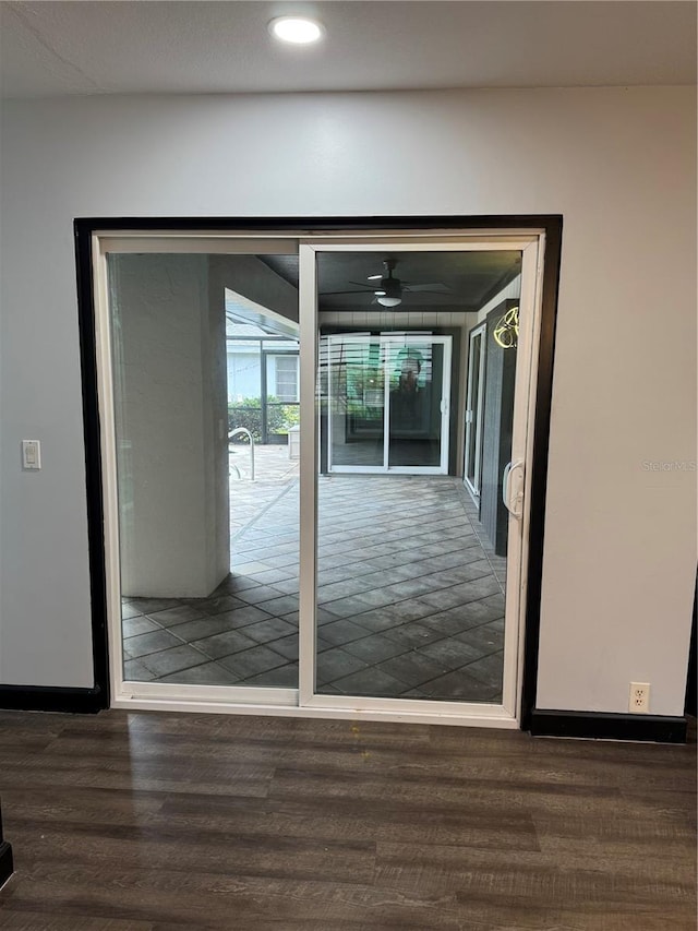 interior space with dark hardwood / wood-style flooring