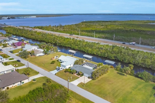 bird's eye view with a water view