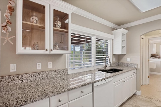 kitchen with sink, white cabinets, white dishwasher, crown molding, and light stone countertops