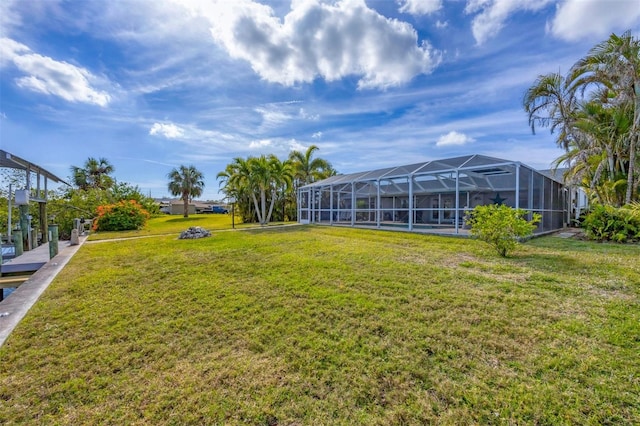 view of yard featuring a lanai