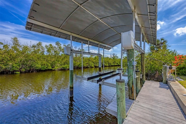 view of dock with a water view