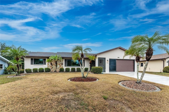 ranch-style home with a garage and a front lawn