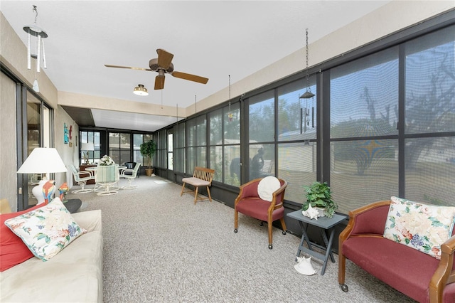 sunroom / solarium with ceiling fan