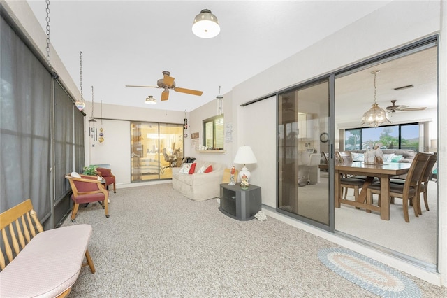 living room featuring ceiling fan