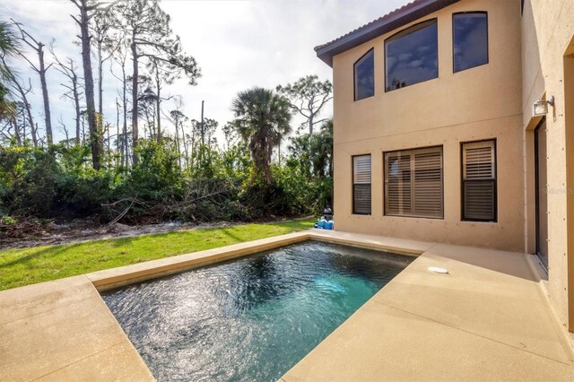 pool with a patio