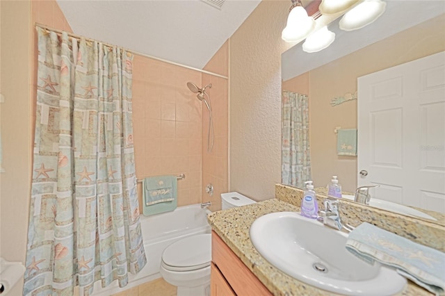 full bathroom featuring vanity, toilet, tile patterned flooring, and shower / bath combo with shower curtain