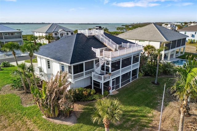 drone / aerial view featuring a water view