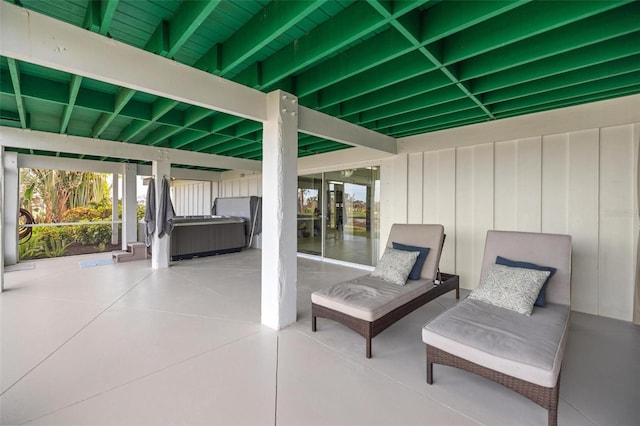 view of patio with a hot tub