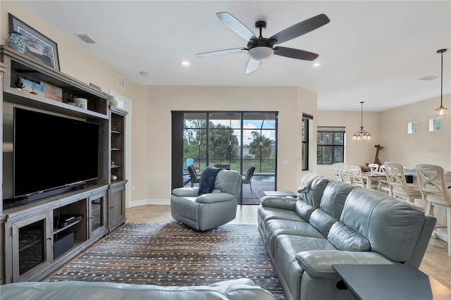 living area featuring recessed lighting, visible vents, a ceiling fan, and light tile patterned flooring