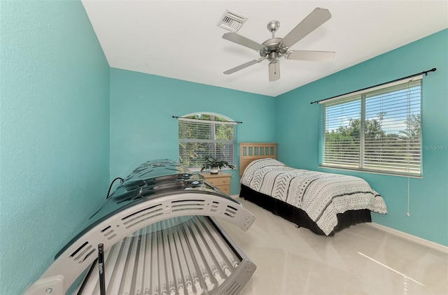 bedroom featuring ceiling fan and carpet flooring