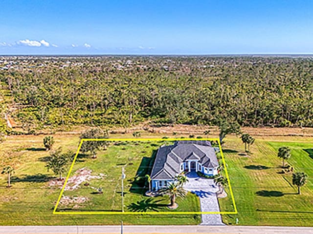 bird's eye view with a rural view