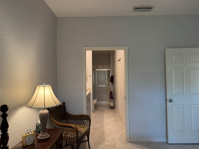 hallway with light tile patterned floors