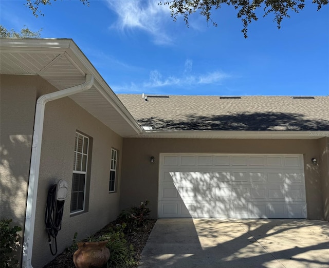 view of property exterior with a garage