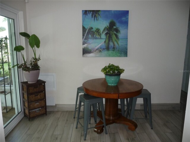 dining room featuring light hardwood / wood-style flooring