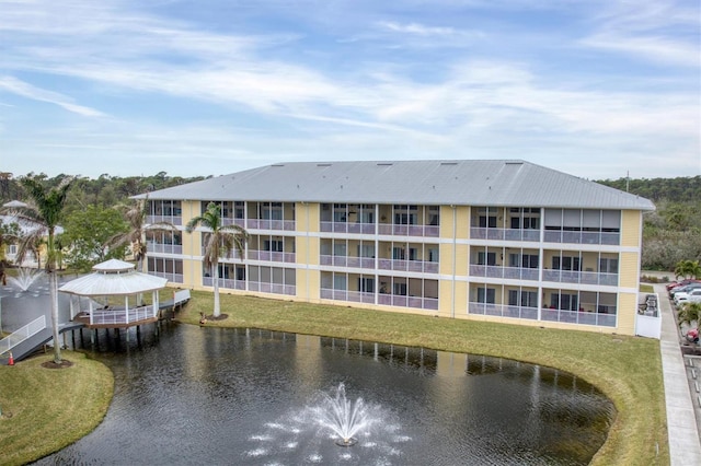 view of property with a water view