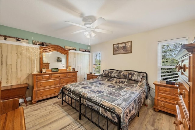 bedroom featuring ceiling fan and light wood-type flooring