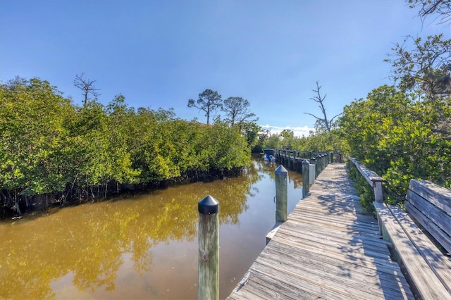 view of dock with a water view