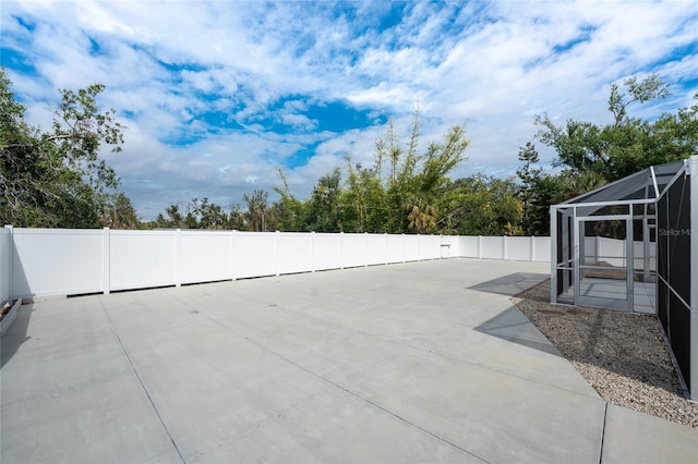 view of patio / terrace with glass enclosure