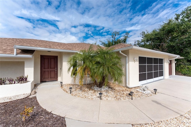 exterior space featuring a garage