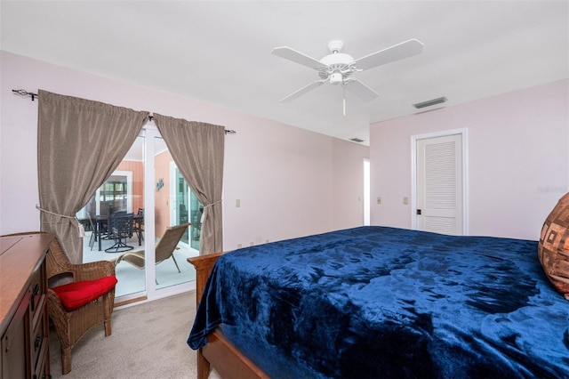 bedroom with access to outside, light colored carpet, and ceiling fan