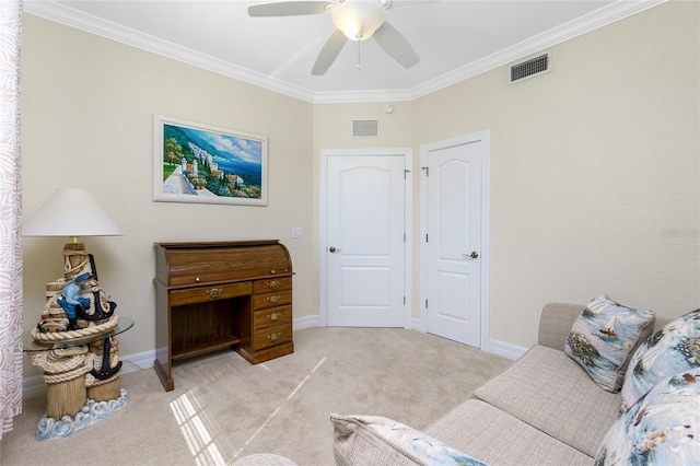 sitting room featuring crown molding, light colored carpet, and ceiling fan