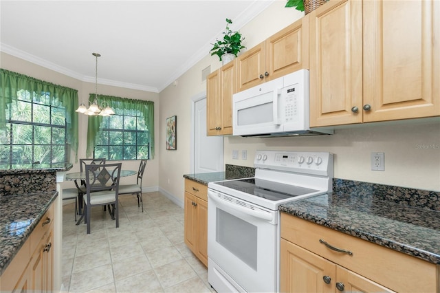 kitchen with white appliances, dark stone countertops, hanging light fixtures, ornamental molding, and light brown cabinetry