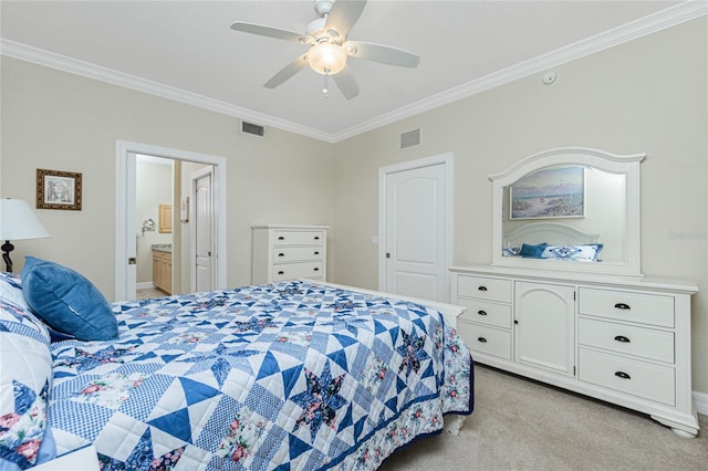 carpeted bedroom with crown molding, ceiling fan, and ensuite bathroom