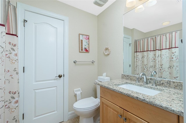 bathroom featuring vanity, toilet, and a shower with shower curtain