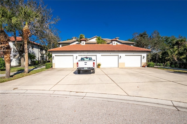 view of side of property with a garage