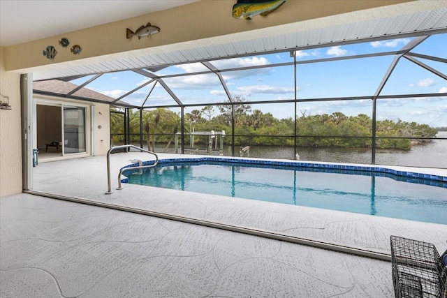 outdoor pool with a water view, a lanai, and a patio area