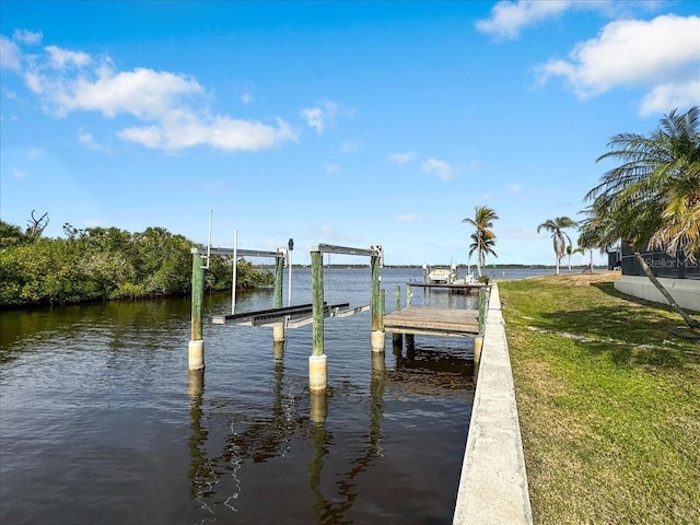 view of dock featuring a water view and boat lift