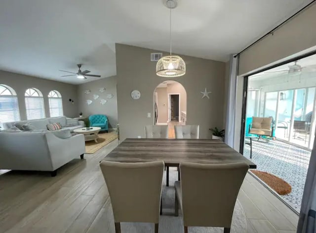 dining area featuring light hardwood / wood-style floors and ceiling fan