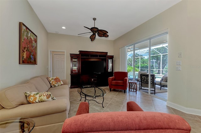 tiled living room with ceiling fan