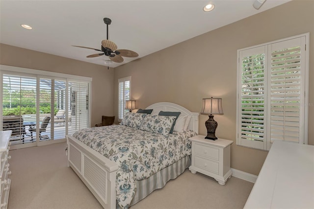 bedroom with light carpet and ceiling fan