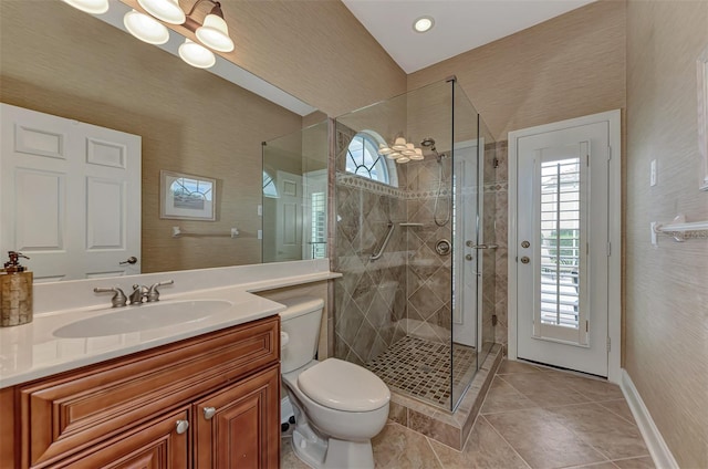 bathroom with tile patterned floors, toilet, an enclosed shower, a chandelier, and vanity