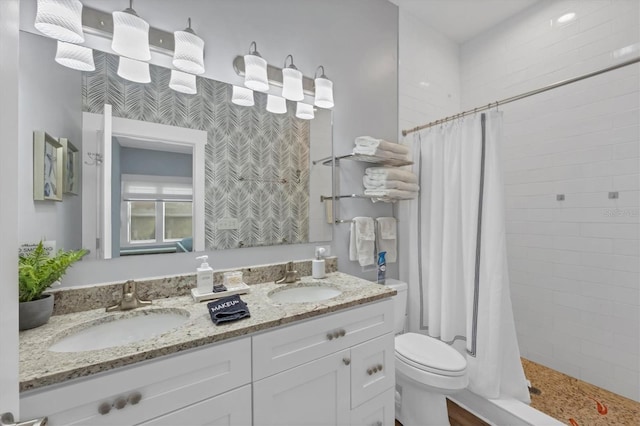 bathroom featuring vanity, a shower with curtain, and toilet