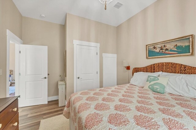 bedroom with light wood-type flooring