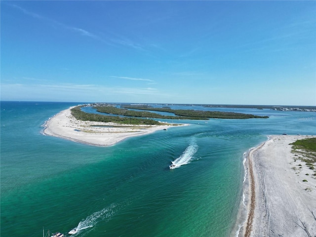 drone / aerial view with a view of the beach and a water view