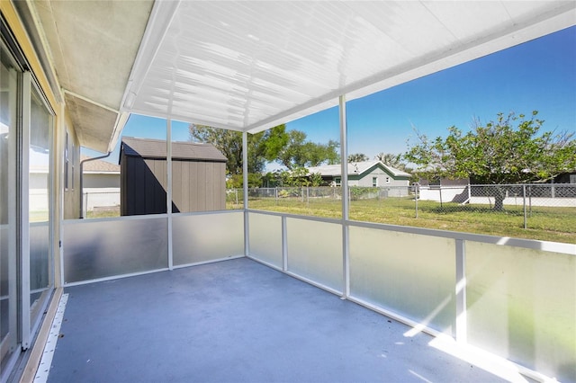 unfurnished sunroom featuring a healthy amount of sunlight